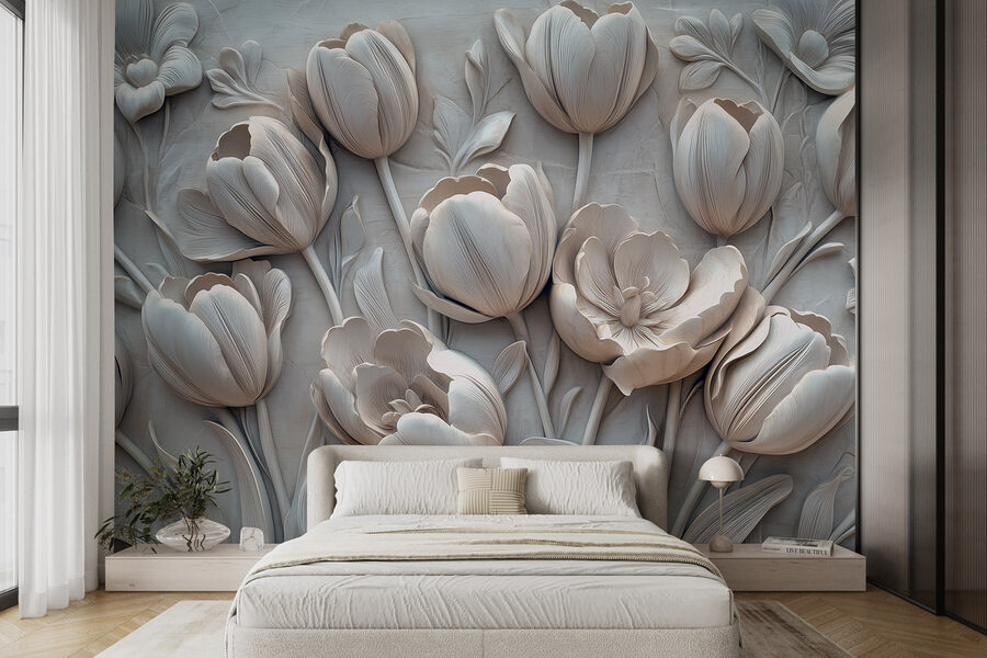 Escultura de uma flor branca numa parede