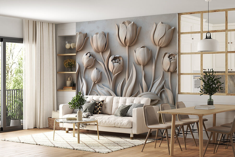 Escultura de uma flor branca numa parede