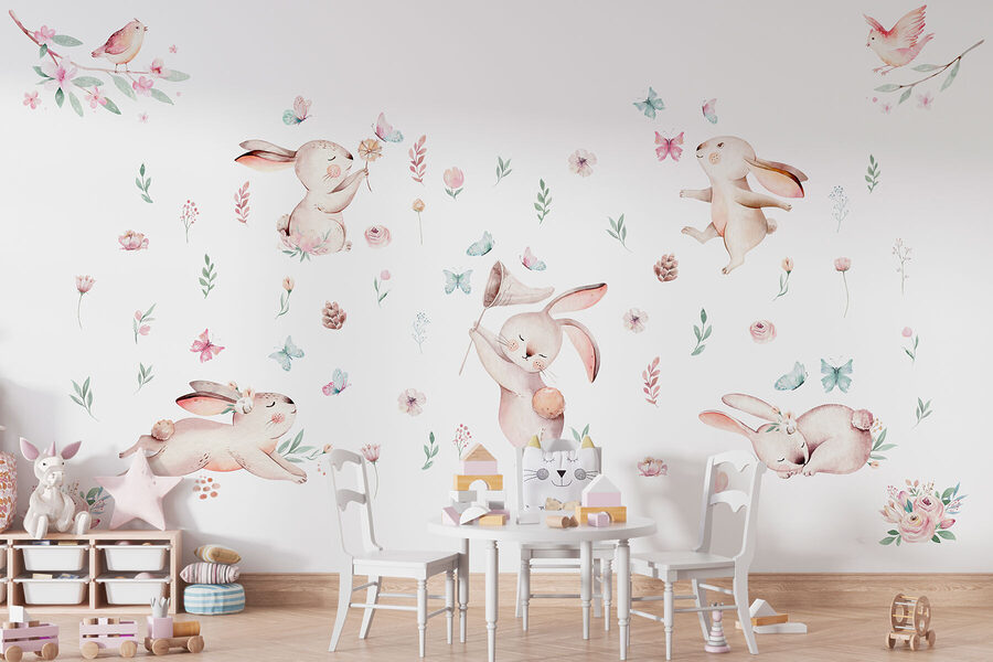 Grupo de coelhos com flores e borboletas