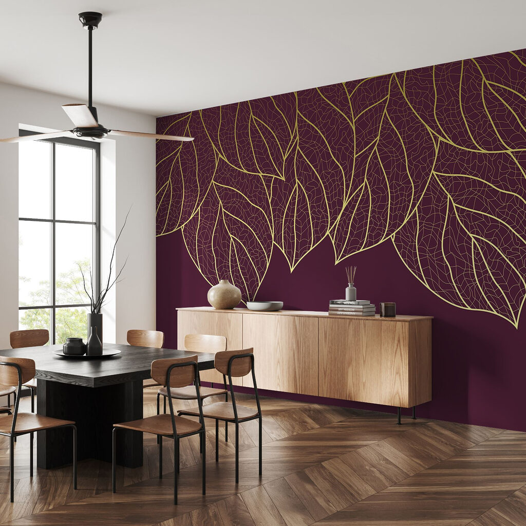 Elegant leaves on deep maroon background
