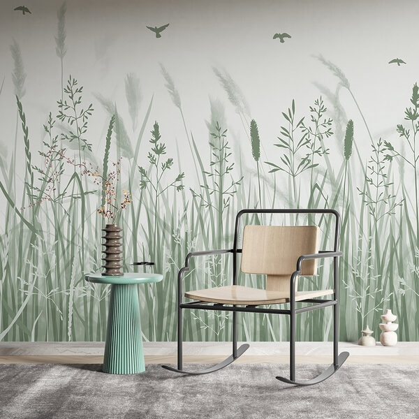 Field of grass with birds flying