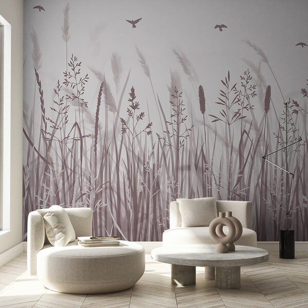 Field of grass with birds flying