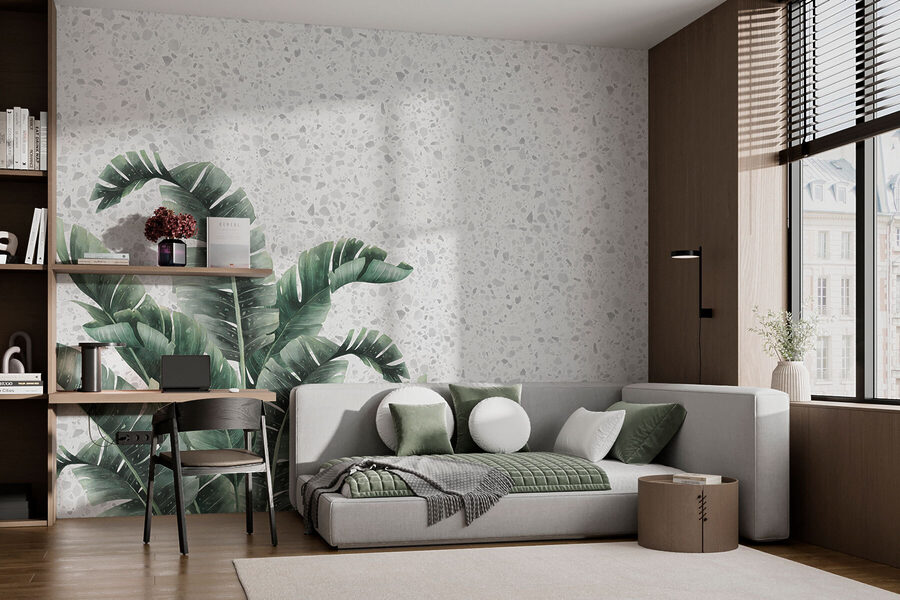 Planta com folhas sobre uma superfície branca