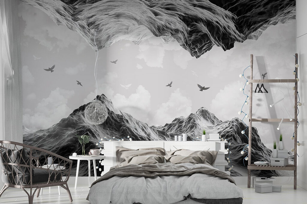 Group of birds flying over a mountain