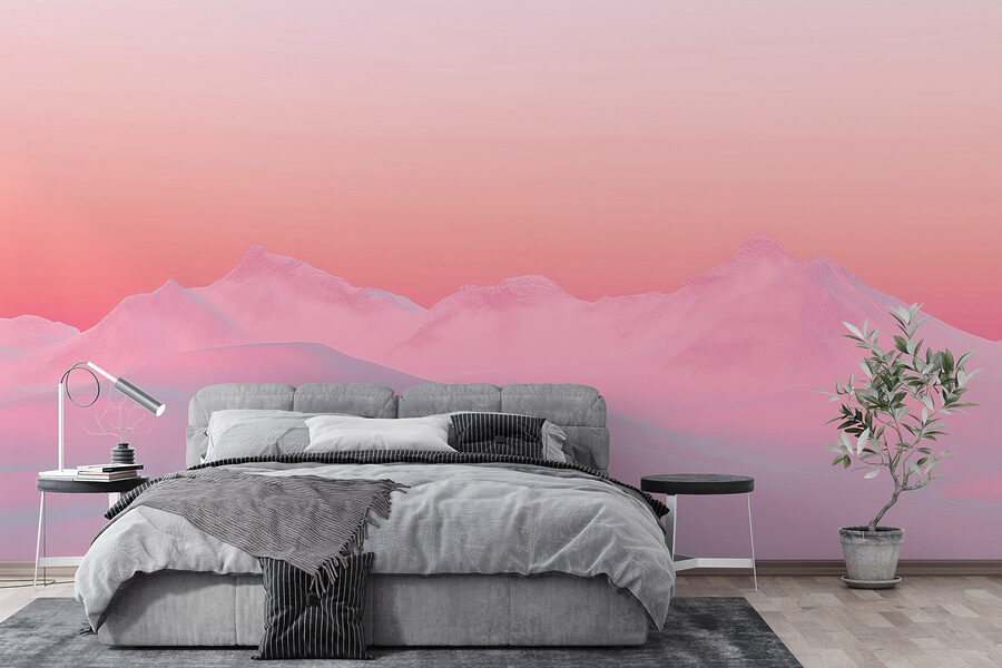 Céu cor-de-rosa e azul sobre uma cadeia de montanhas nevadas