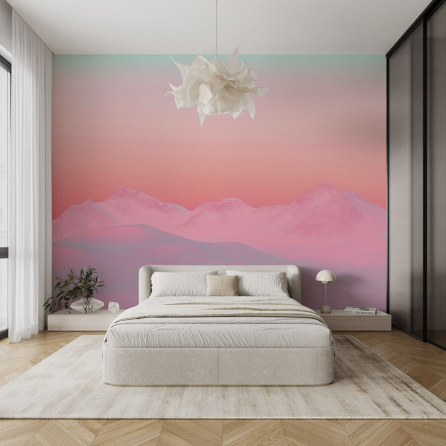 Céu cor-de-rosa e azul sobre uma cadeia de montanhas nevadas