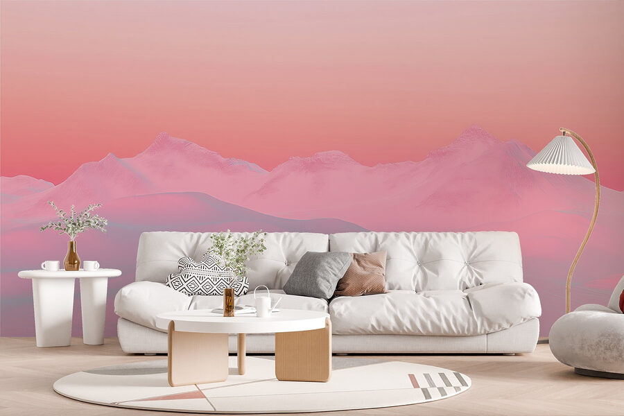 Céu cor-de-rosa e azul sobre uma cadeia de montanhas nevadas