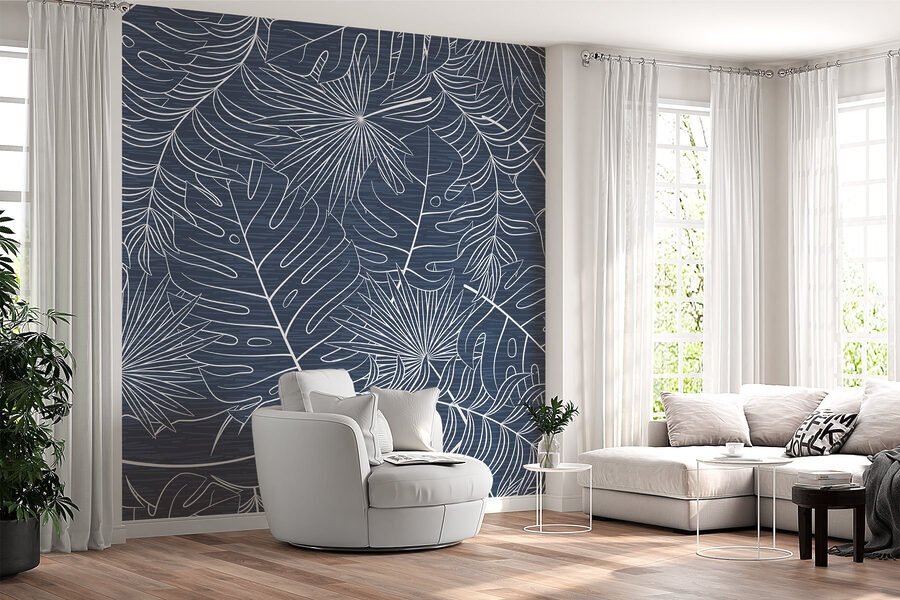 Padrão de folhas sobre um fundo azul Padrão de folhas sobre um fundo azul