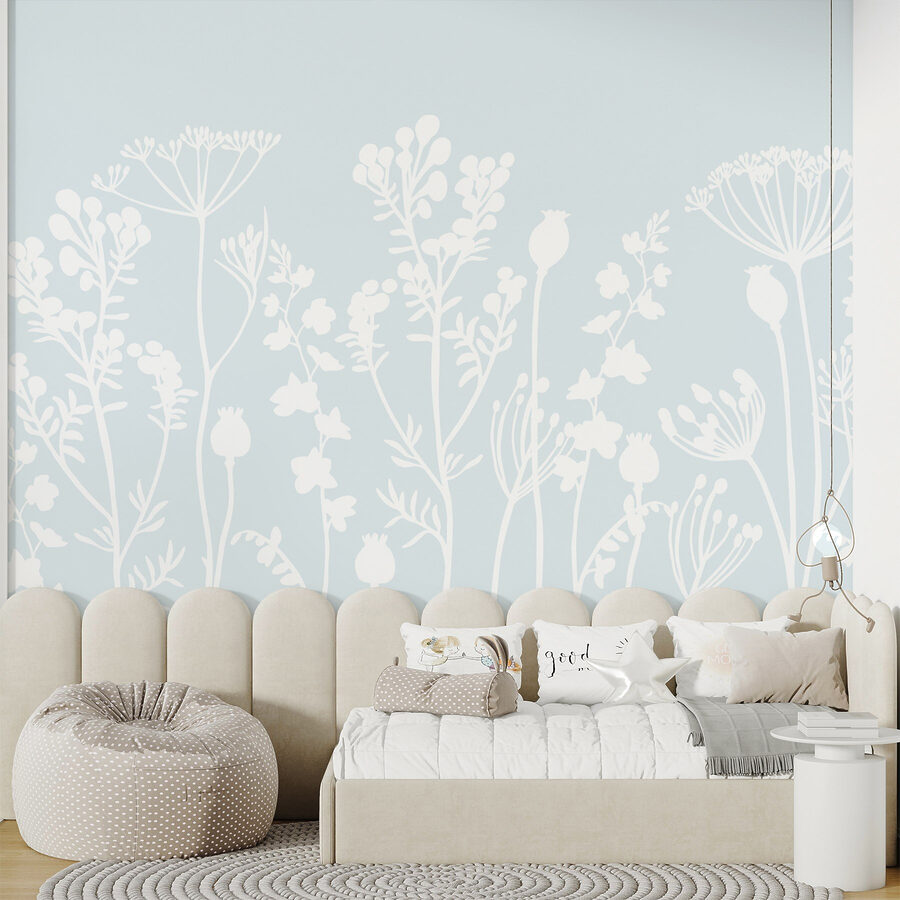 Flores e folhas brancas sobre um fundo azul claro
