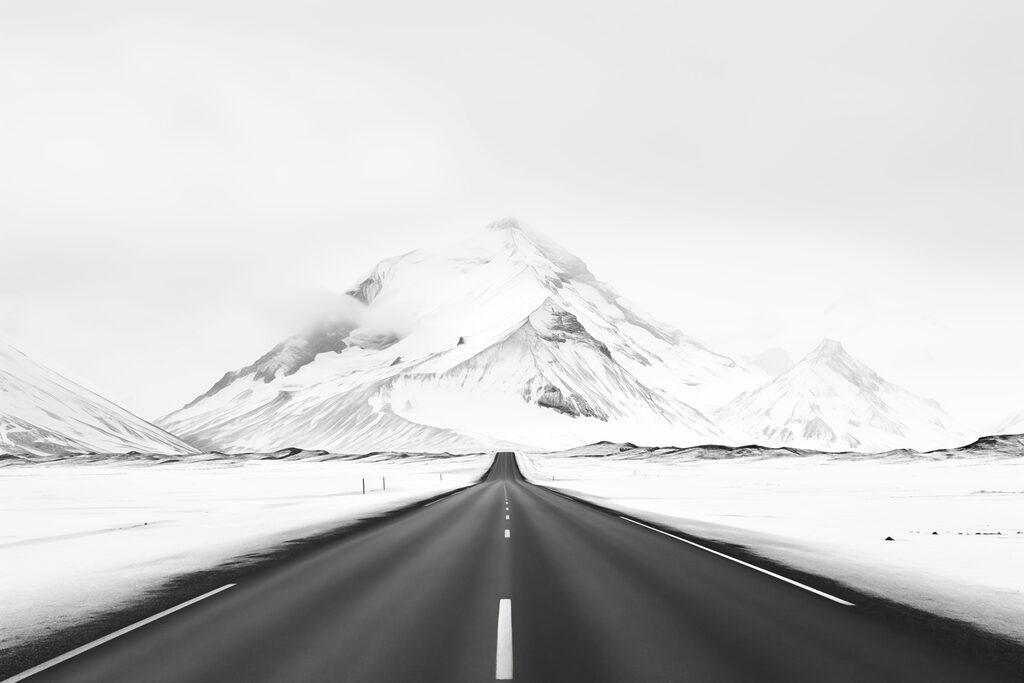 Road leading to a snowy mountain Road leading to a snowy mountain
