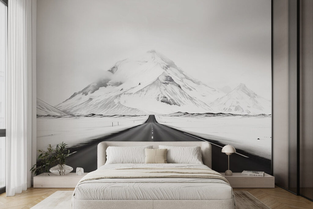 Road leading to a snowy mountain Road leading to a snowy mountain