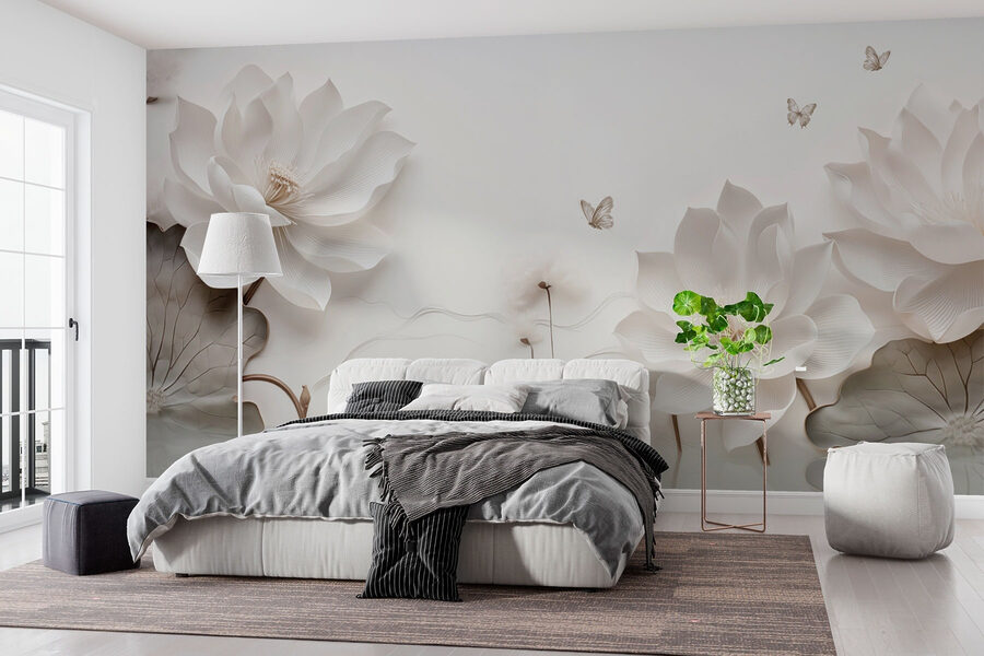Flores e borboletas de papel branco sobre uma superfície branca