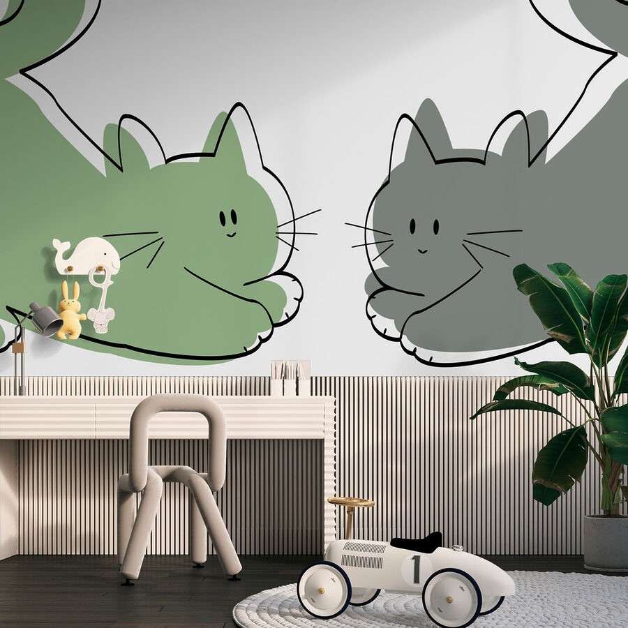 Um par de gatos deitados
