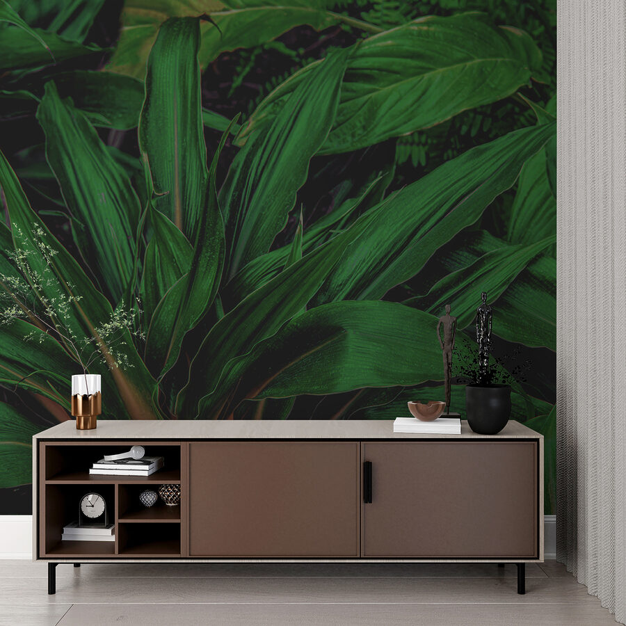 Folhas tropicais exuberantes num verde vibrante.