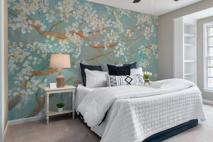 Pintura de um ramo de árvore com flores brancas