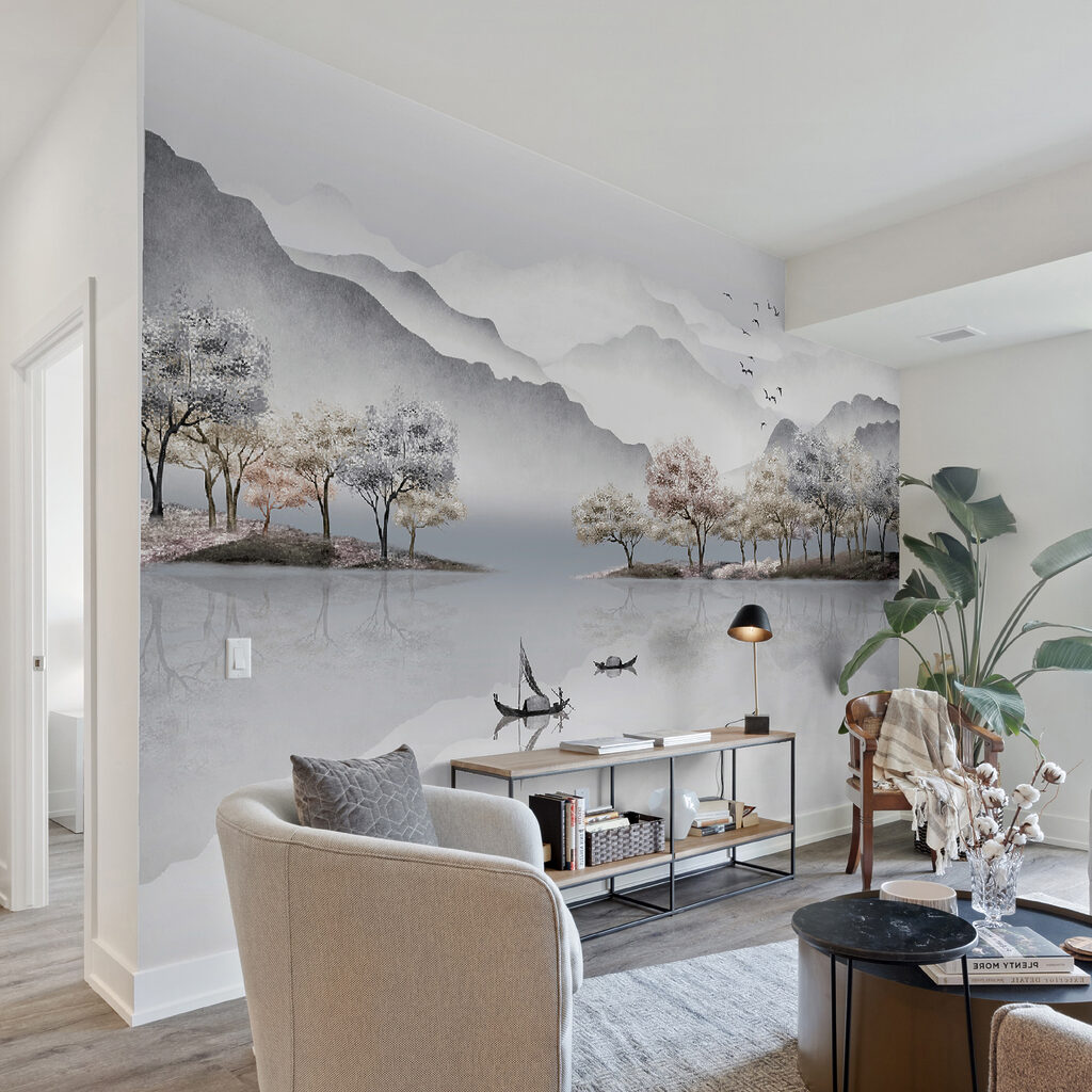 Painting of a lake with trees and mountains