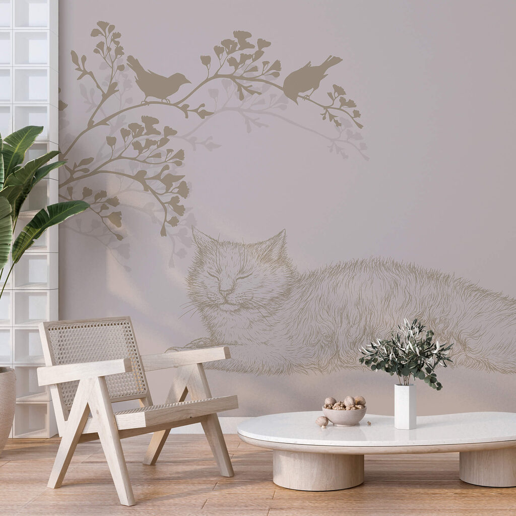 Gato deitado num ramo de árvore