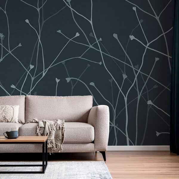 Galhos delicados contra um fundo escuro