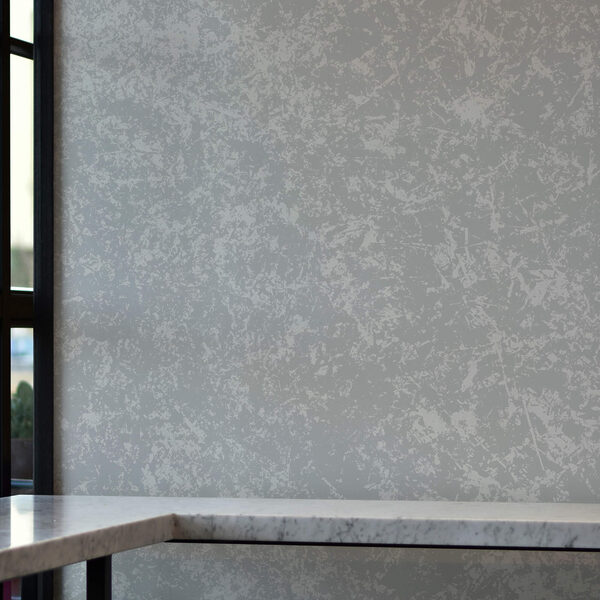 Superfície salpicada de branco com pequenos pontos