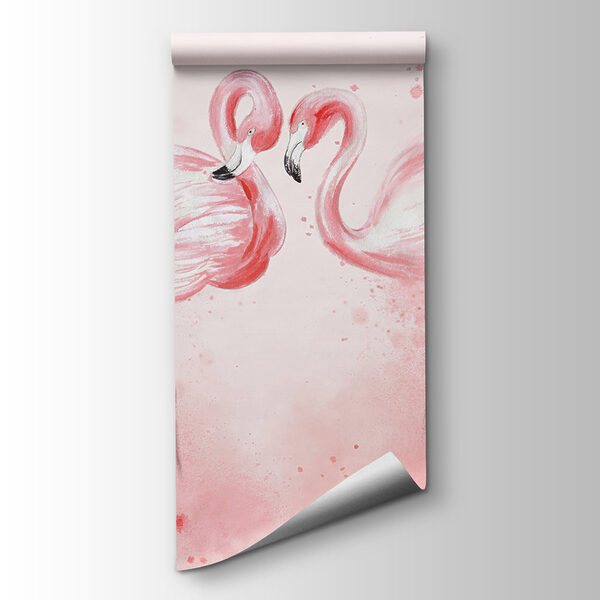 Two flamingos standing next to each other