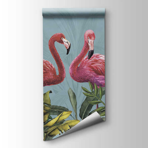 Two pink flamingos and green leaves