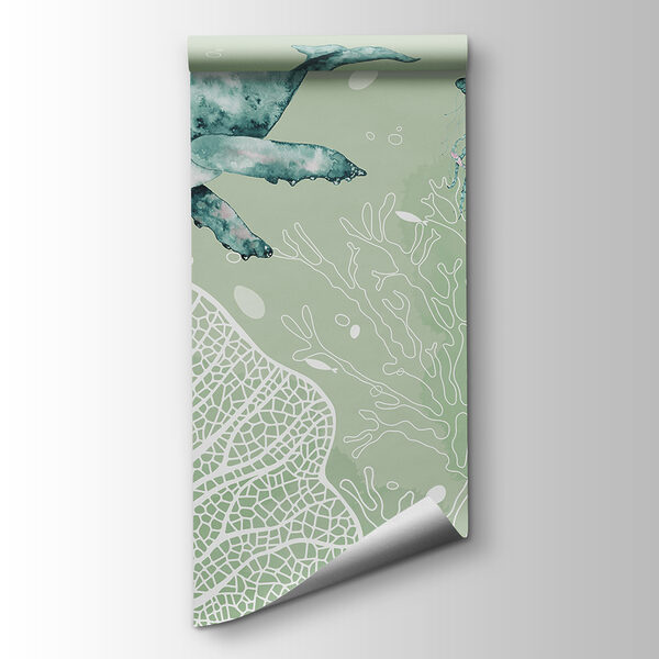 A whale and stingrays swimming in the ocean A whale and stingrays swimming in the ocean