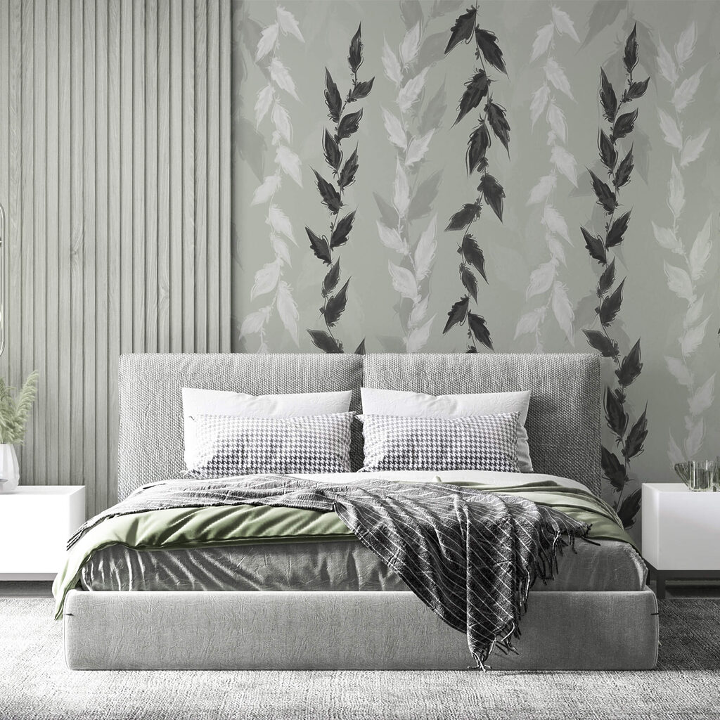 Folhas pretas e brancas sobre fundo cinza