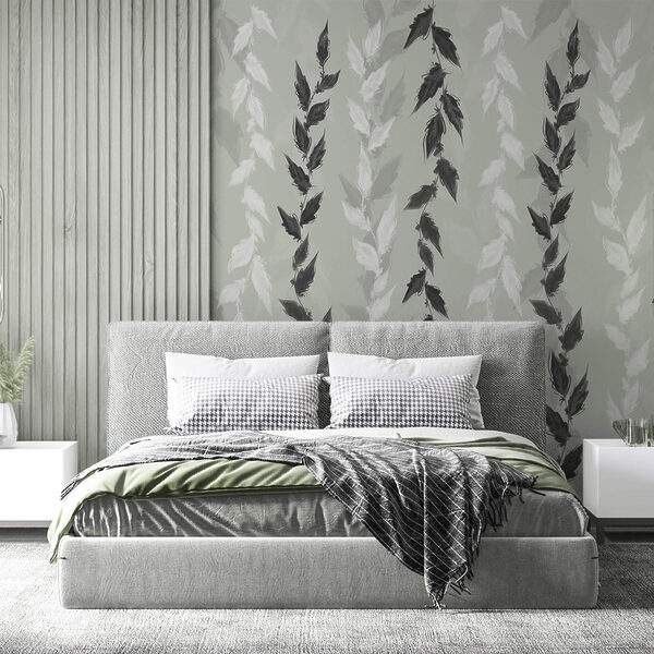 Folhas pretas e brancas sobre fundo cinza