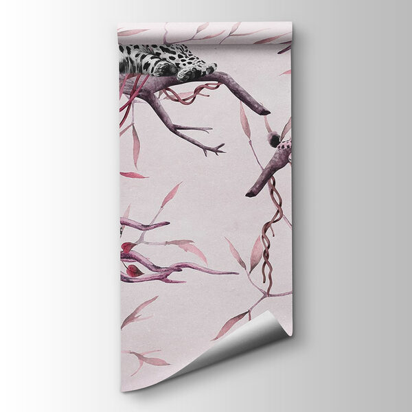 Group of leopards lying on a tree branch