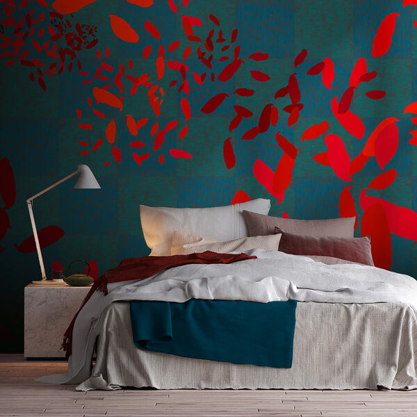 Folhas vermelhas sobre fundo azul