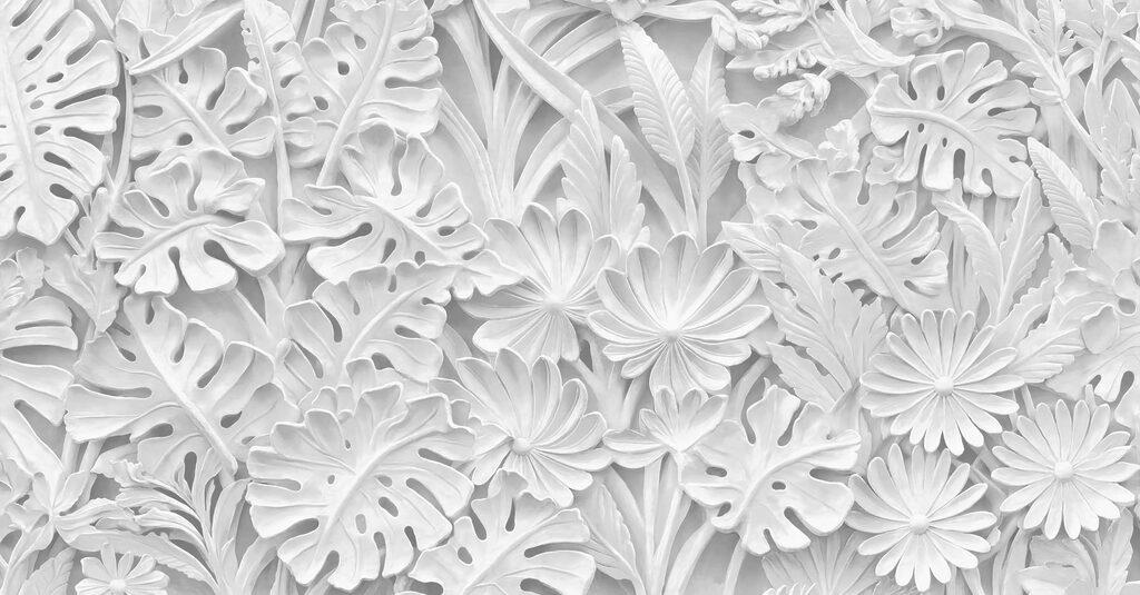 White wall with flowers and leaves White wall with flowers and leaves